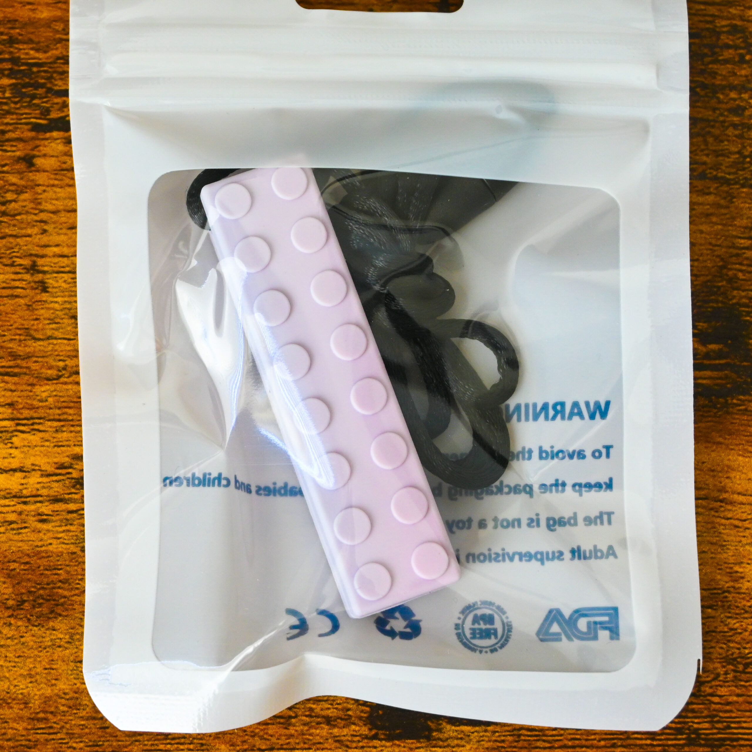 light purple building block toy shaped chew necklace