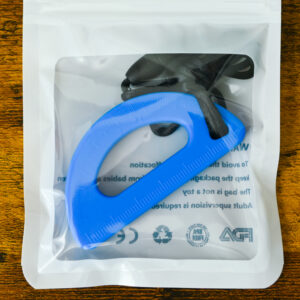 blue math protractor shaped chew necklace with the measuring lines on the pendant for texture