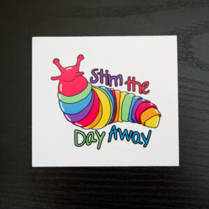 slug fidget toy with a link head, rainbow body, and yellow tail tip and the text "Stim the Day Away"