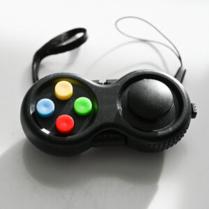 black fidget with multicolored buttons, black joystick, black switches, and black gears on the sides.